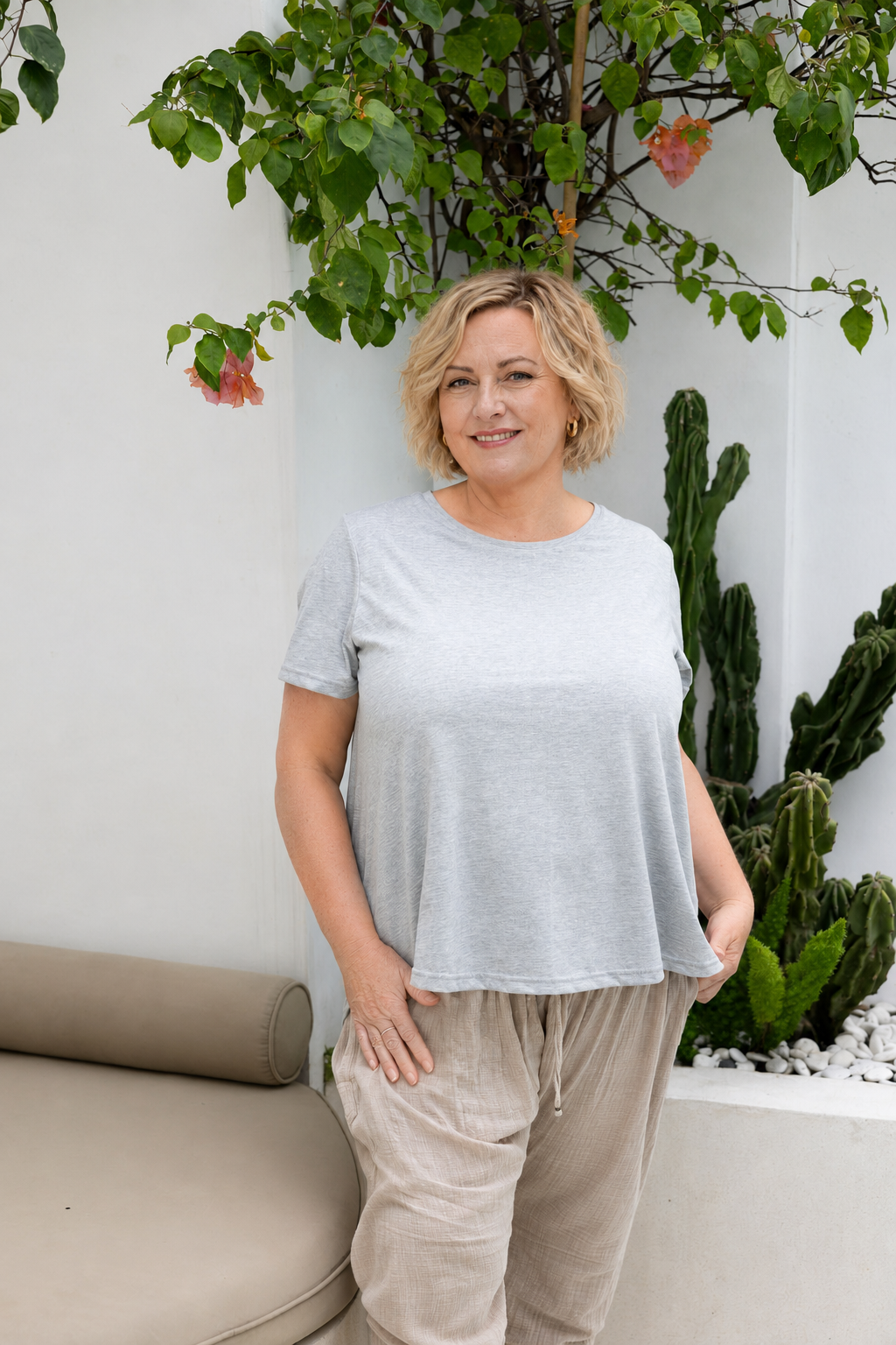Woman wearing Monaco Top in Grey Marle. Relaxed fit, a-line silhouette t-shirt, 100% cotton.