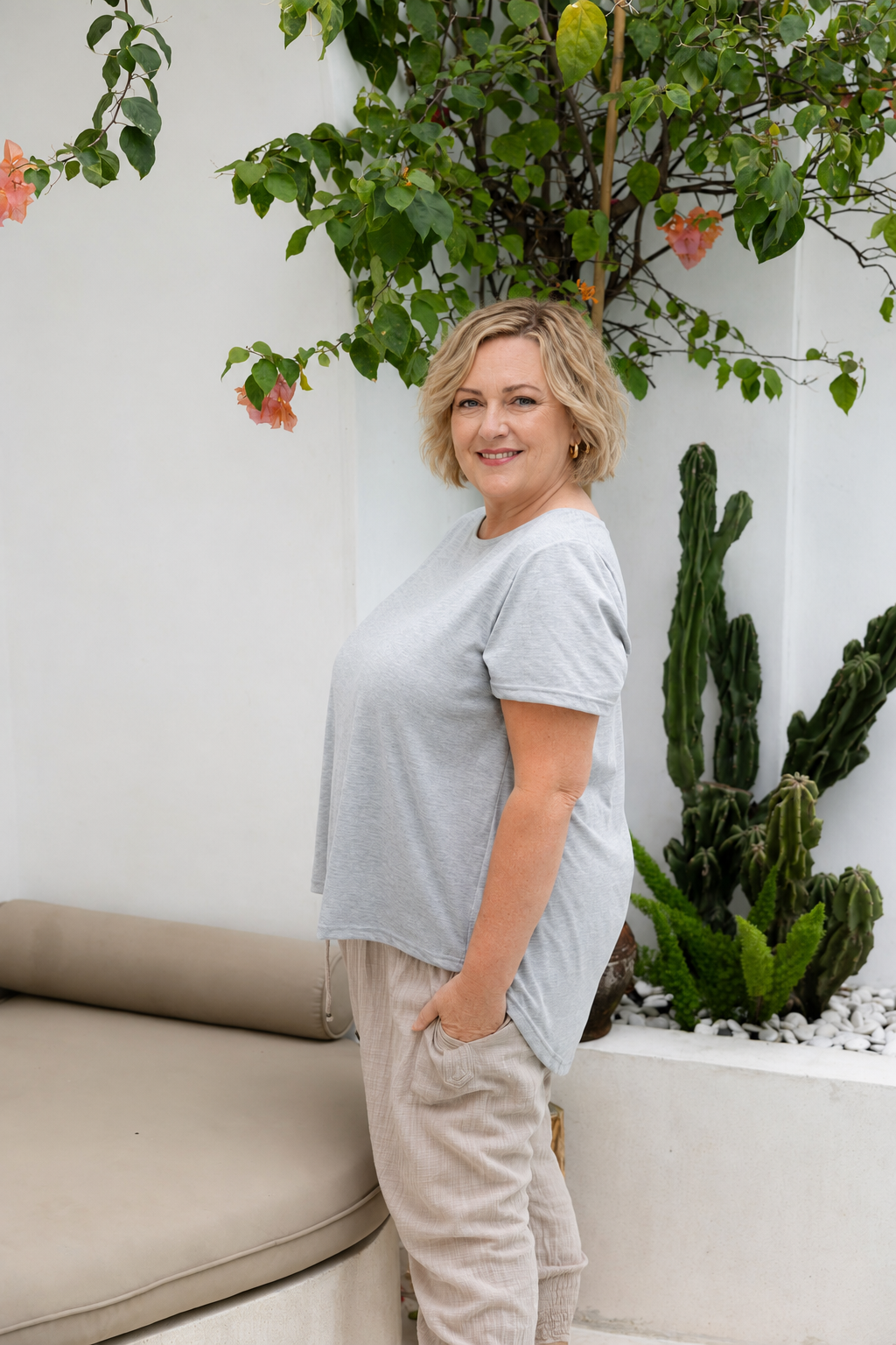 Woman wearing Monaco Top in Grey Marle. Relaxed fit, a-line silhouette t-shirt, 100% cotton.