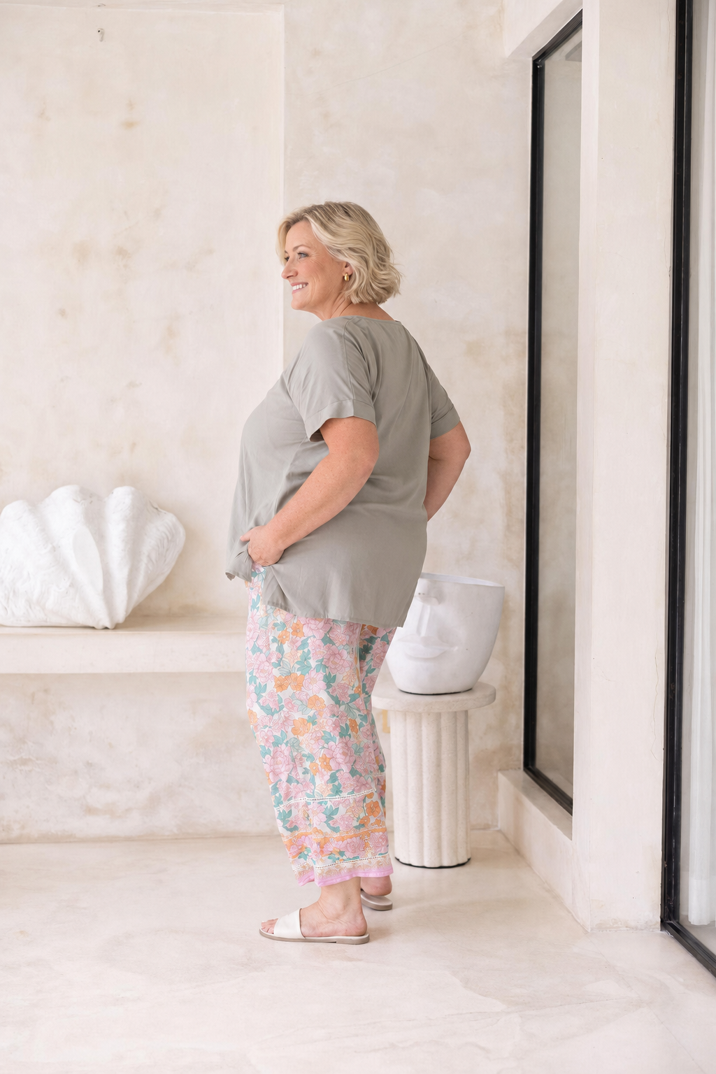 Woman wearing the Vctoria Top in Sage. Relaxed woven t-shirt in 100% soft Rayon