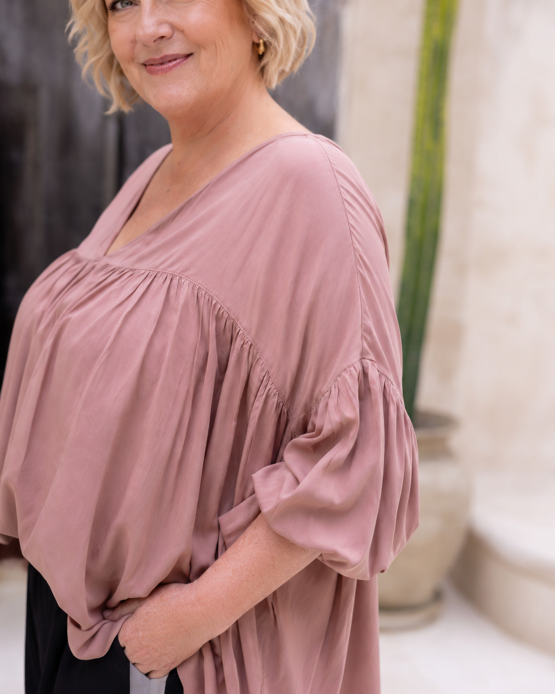 Woman wearing the Florence Top in Mocca, relaxed oversized fit, boho style