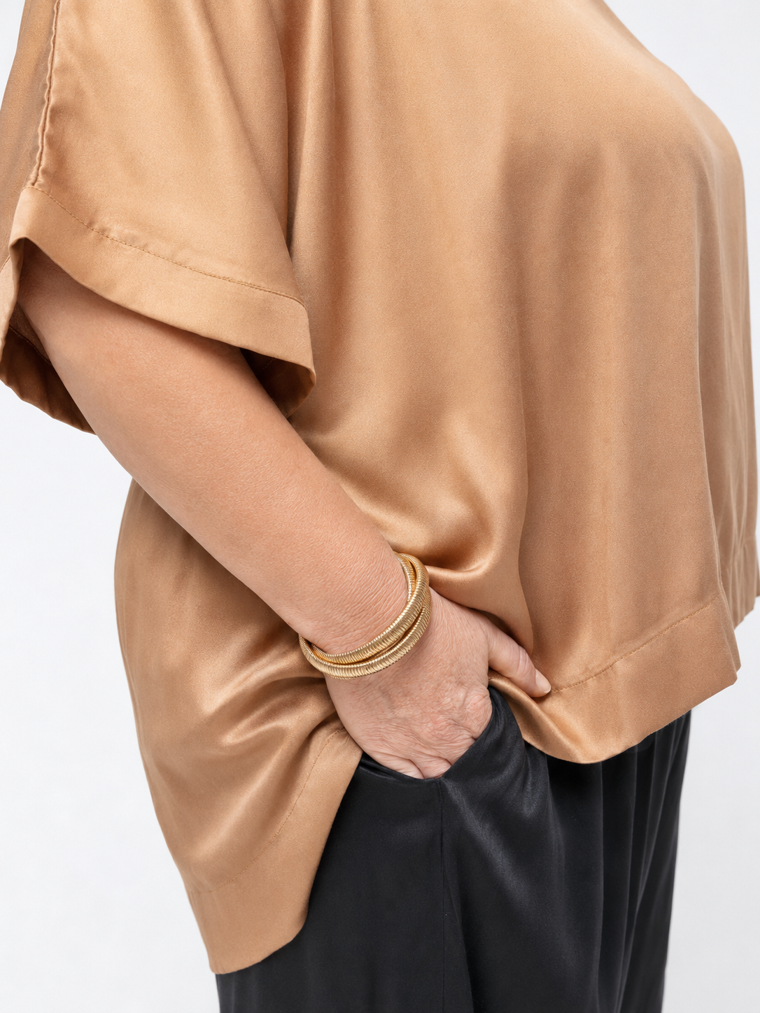 Woman wearing Salina Top in Walnut - Luxe Satin. Relaxed fit, elbow length Dolman sleeve
