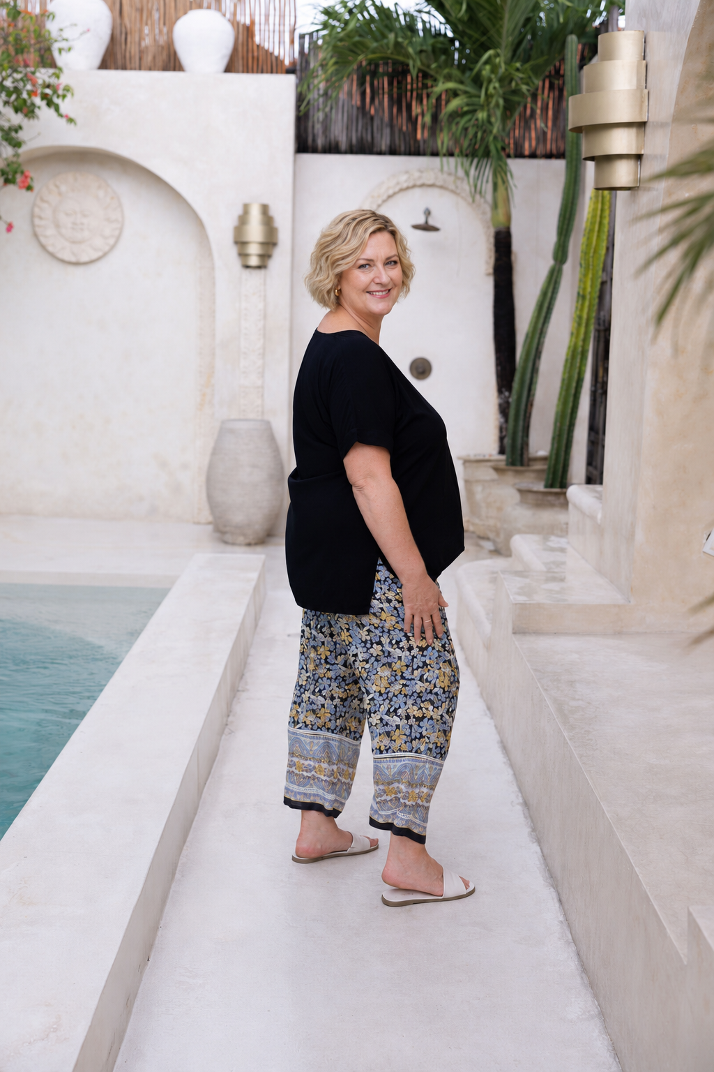 Woman wearing the Vctoria Top in Black,  Relaxed woven t-shirt in 100% soft Rayon