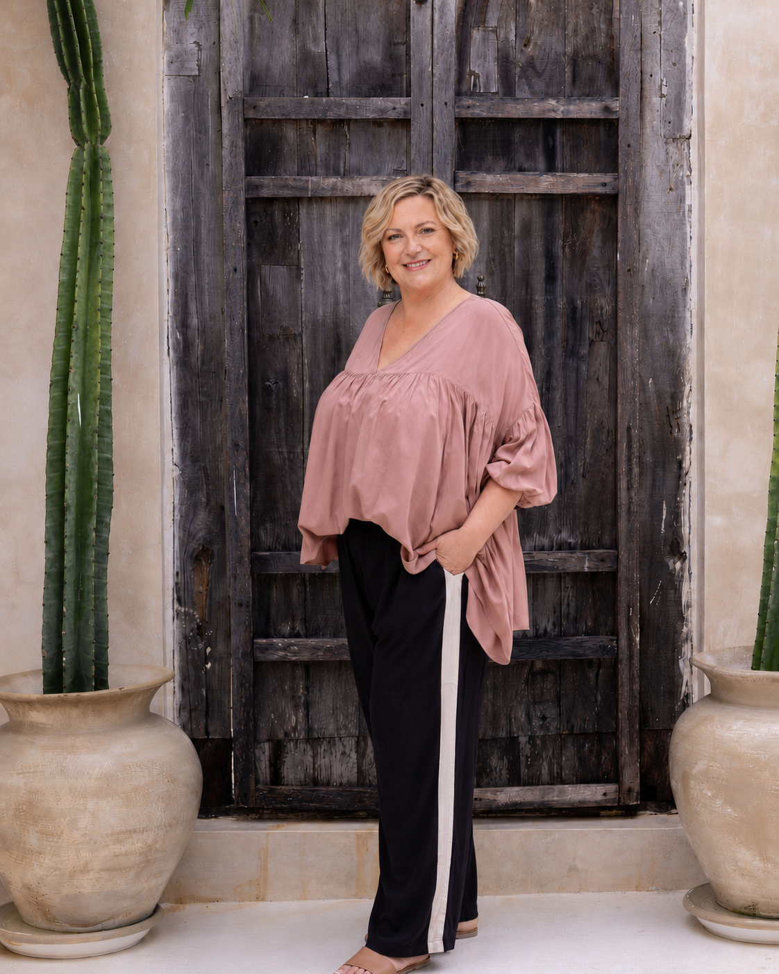 Woman wearing the Florence Top in Mocca, relaxed oversized fit, boho style