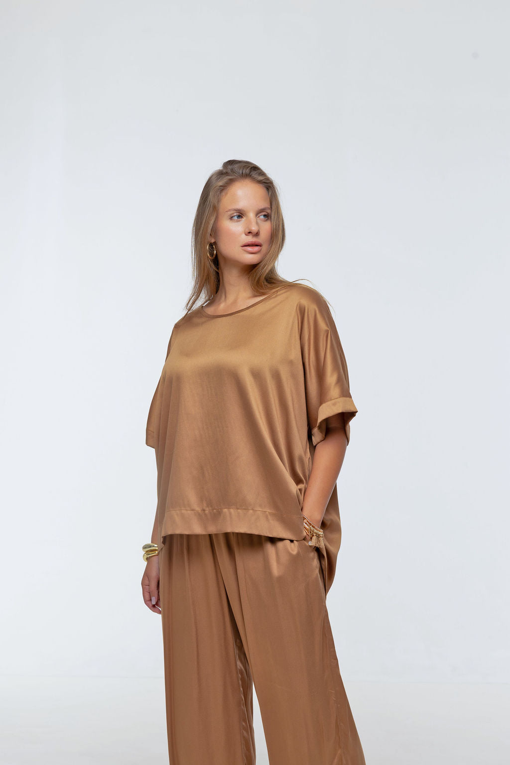 Woman wearing Salina Top in Walnut - Luxe Satin.  Relaxed fit, elbow length Dolman sleeve 