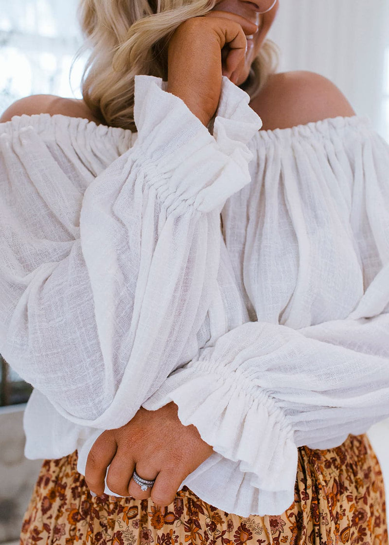 Salt and Soda Design For Every Season Every Body Every Day Ouvea Blouse Ivory Muslin 100% Muslin Organic Material Australian Womens Ethical Fashion Label Off Shoulder Blouse with Raw Tassel Detail Tie and Frill Sleeves