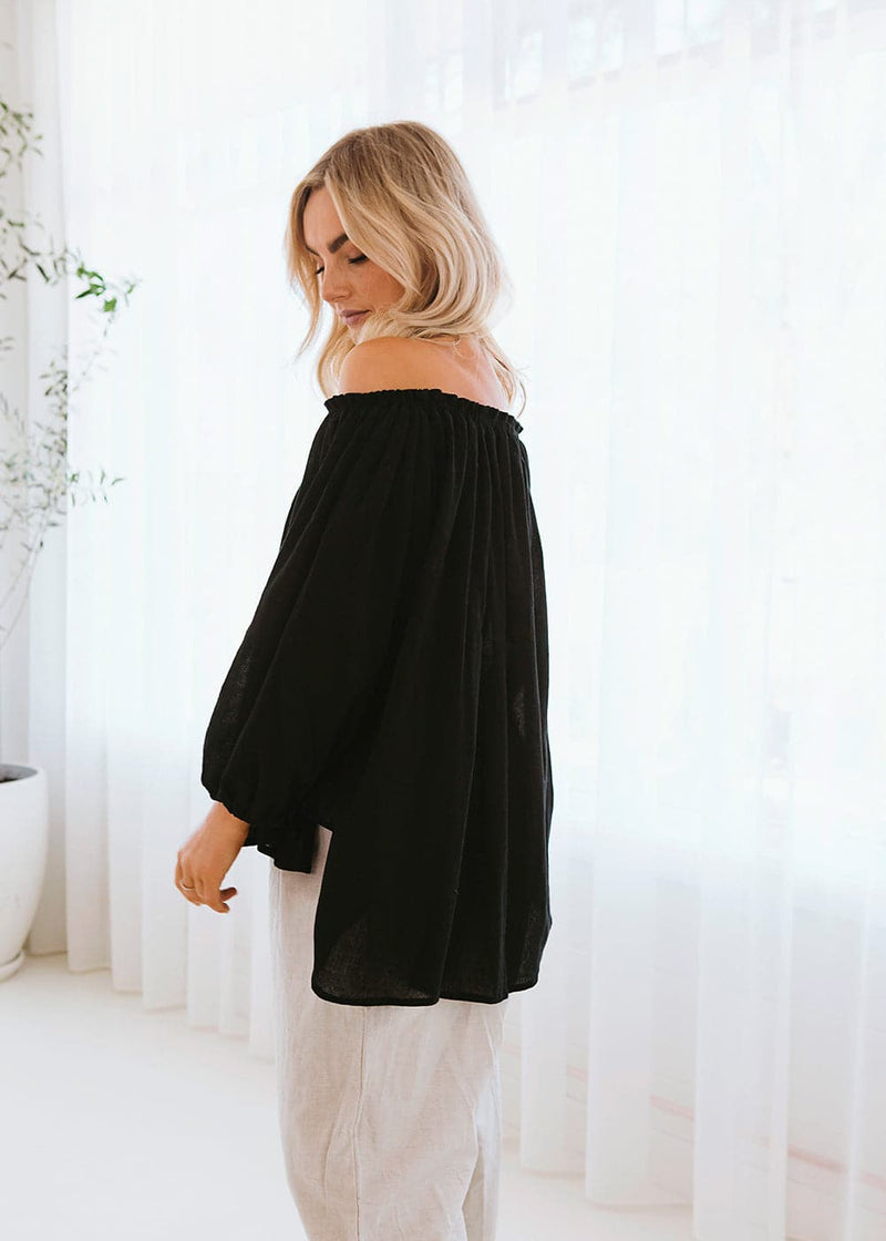 Salt and Soda Design For Every Season Every Body Every Day Ouvea Blouse Ebony 100% Muslin Organic Material Australian Womens Ethical Fashion Label Off Shoulder Blouse with Raw Tassel Detail Tie and Frill Sleeves