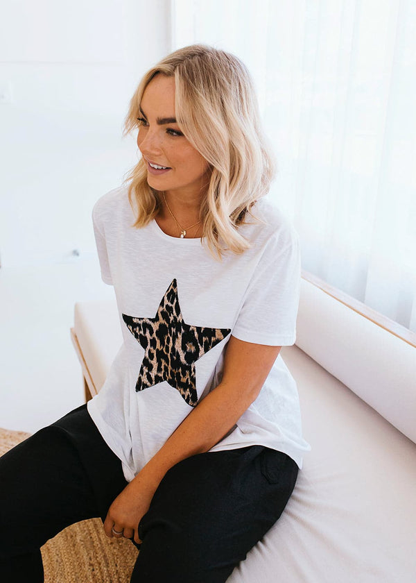 Salt & Soda Design For Everybody For Every Season For Every Day Monaco Tee Crisp White Uncomplicated and practical, it features a fabric print star detail, scoop hemline and is made from 100% organic cotton. Dress up or down. Leopard Print Star Shirt