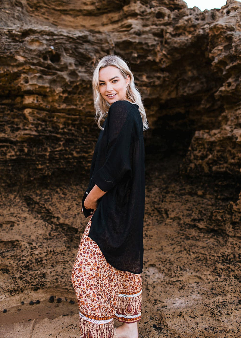 Salt & Soda Design For Everybody For Every Season For Every Day Libson Shirt Ebony Linen Loose Fitting Button up Chefs Collar 3/4 Quarter Length Sleeves Feature Button Detail Can Be Layered.